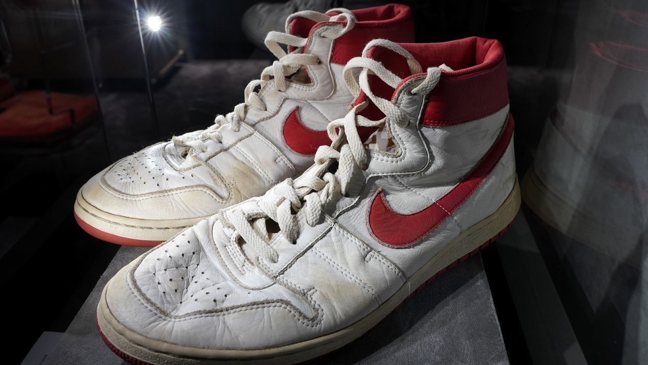 The Air Ship, MJ Player Exclusive, Game-Worn Sneaker Nike, 1984, Left Shoe: Size 13.5, Right Shoe: Size 13, High-Top on display during a press preview July 24, 2020 at Christie's New York. - Christies and Stadium Goods have partnered to offer a unique sneaker overview of Michael Jordans era-defining Chicago Bulls career. The auction is online only 30 July13 August.