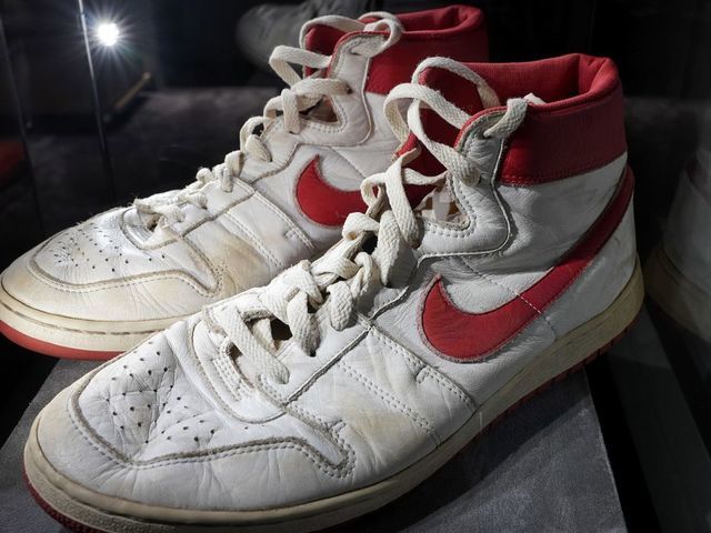 The Air Ship, MJ Player Exclusive, Game-Worn Sneaker Nike, 1984, Left Shoe: Size 13.5, Right Shoe: Size 13, High-Top on display during a press preview July 24, 2020 at Christie's New York. - Christies and Stadium Goods have partnered to offer a unique sneaker overview of Michael Jordans era-defining Chicago Bulls career. The auction is online only 30 July13 August.