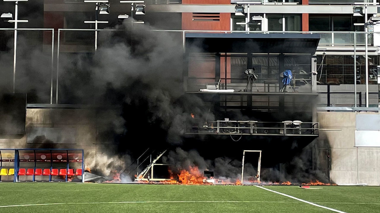 A fire breaks out at Estadi Nacional, Andorra. Preparations for Englands World Cup qualifier in Andorra were hit by a fire at the Estadi Nacional. The television gantry at the side of the 3,300-seater stadium was engulfed in flames on Friday afternoon, three hours after England had trained there. Picture date: Friday October 8, 2021.