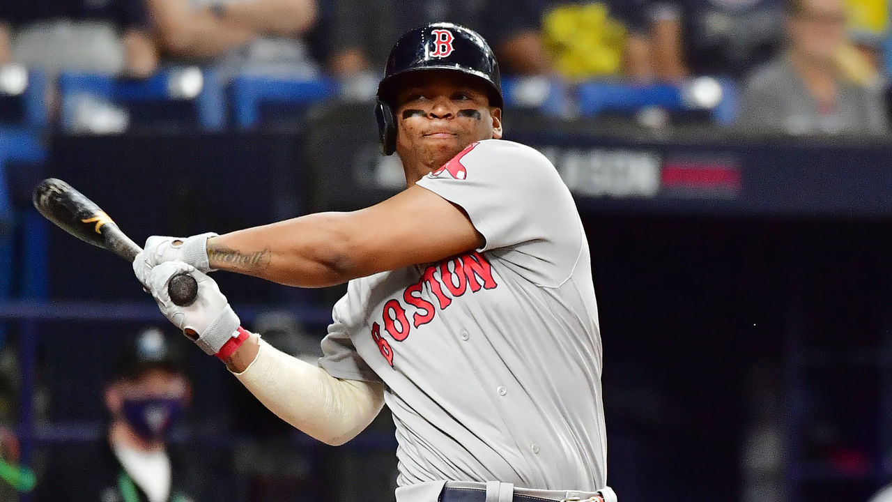 ST PETERSBURG, FLORIDA - OCTOBER 07: Rafael Devers #11 of the Boston Red Sox strikes out in the eighth inning against the Tampa Bay Rays during Game 1 of the American League Division Series at Tropicana Field on October 07, 2021 in St Petersburg, Florida.