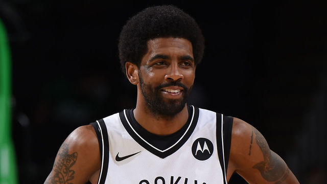 BOSTON, MA - MAY 28: Kyrie Irving #11 of the Brooklyn Nets smiles during the game against the Boston Celtics during Round 1, Game 3 of the 2021 NBA Playoffs on May 28, 2021 at the TD Garden in Boston, Massachusetts. Mandatory Copyright Notice: Copyright 2021 NBAE