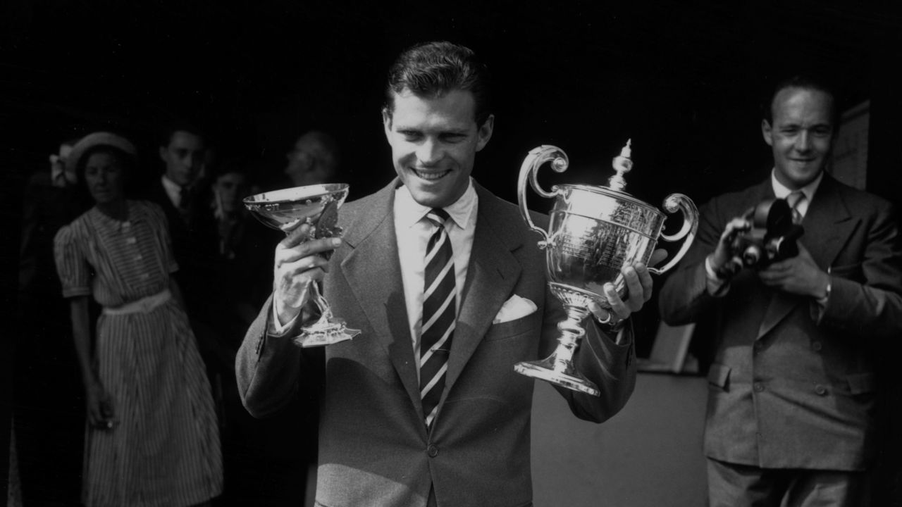 7th July 1950: Budge Patty with his men's singles trophy at the Wimbledon Lawn Tennis Championships.