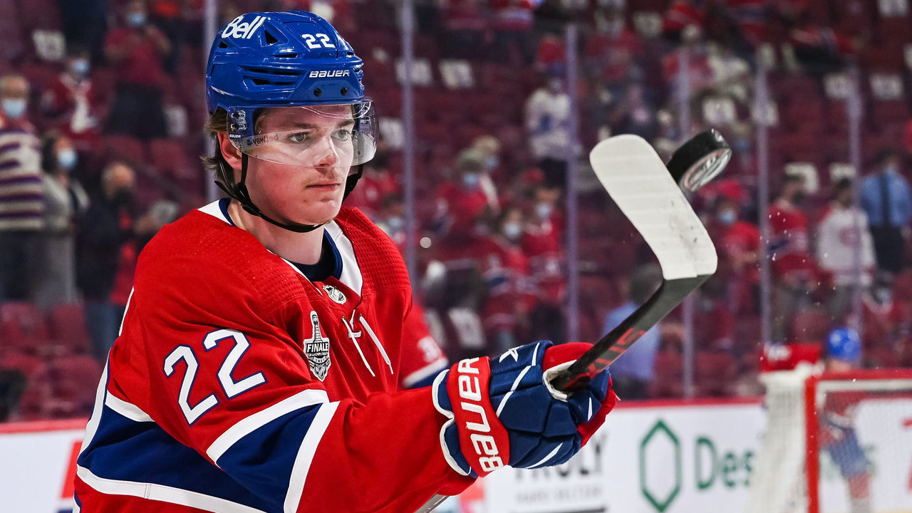 MONTREAL, QC - JULY 02: Montreal Canadiens right wing Cole Caufield (22) plays with a puck at warm-up before the NHL Stanley Cup Playoffs Final game 3 between the Tampa Bay Lightning versus the Montreal Canadiens on July 02, 2021, at Bell Centre in Montreal, QC