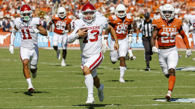 DALLAS, TX - OCTOBER 09: Oklahoma Sooners quarterback Caleb Williams (13) runs for a touchdown during the Red River Showdown between the Texas Longhorns and the Oklahoma Sooners on October 09, 2021 at the Cotton Bowl in Dallas, Texas.