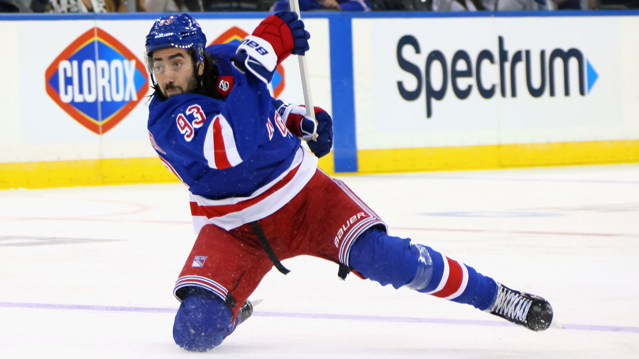 NEW YORK, NEW YORK - SEPTEMBER 26: Mika Zibanejad #93 of the New York Rangers takes the second period shot against the New York Islanders in a preseason game at Madison Square Garden on September 26, 2021 in New York City.