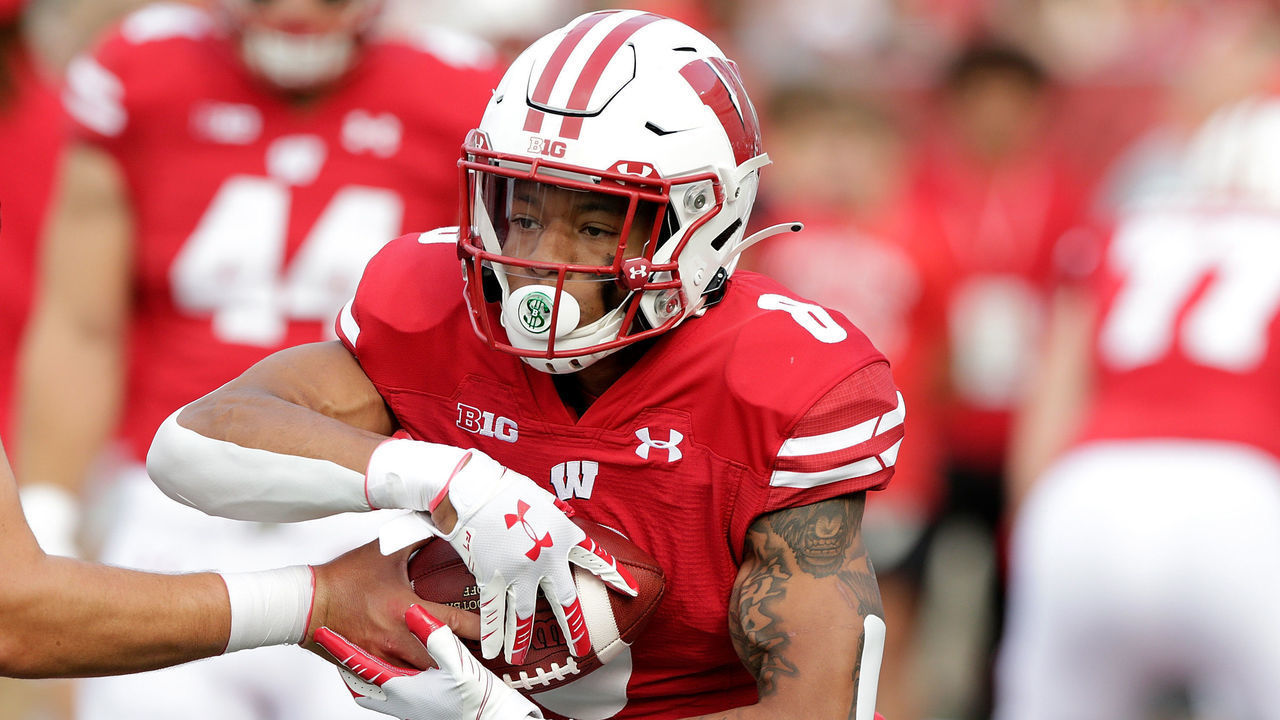 MADISON, WISCONSIN - OCTOBER 02: Jalen Berger #8 of the Wisconsin Badgers warms up before the game against the Michigan Wolverines at Camp Randall Stadium on October 02, 2021 in Madison, Wisconsin. Michigan defeated Wisconsin 38-17.