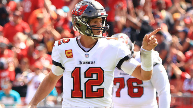 TAMPA, FLORIDA - OCTOBER 10: Tom Brady #12 of the Tampa Bay Buccaneers reacts after throwing a touchdown pass to Antonio Brown #81 (not pictured) during the second quarter against the Miami Dolphins at Raymond James Stadium on October 10, 2021 in Tampa, Florida.