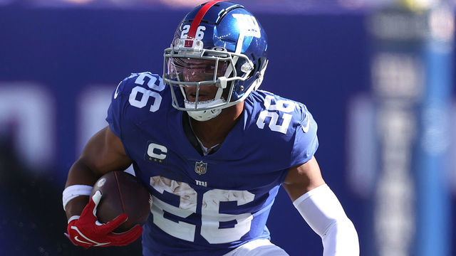 EAST RUTHERFORD, NEW JERSEY - SEPTEMBER 26: Saquon Barkley #26 of the New York Giants in action against the Atlanta Falcons during their game at MetLife Stadium on September 26, 2021 in East Rutherford, New Jersey.