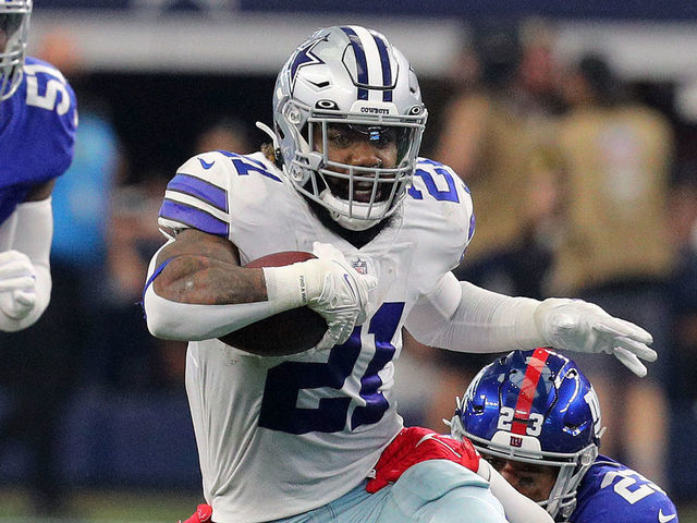 ARLINGTON, TEXAS - OCTOBER 10: Ezekiel Elliott #21 of the Dallas Cowboys runs the ball during the first half against the New York Giants at AT&T Stadium on October 10, 2021 in Arlington, Texas.