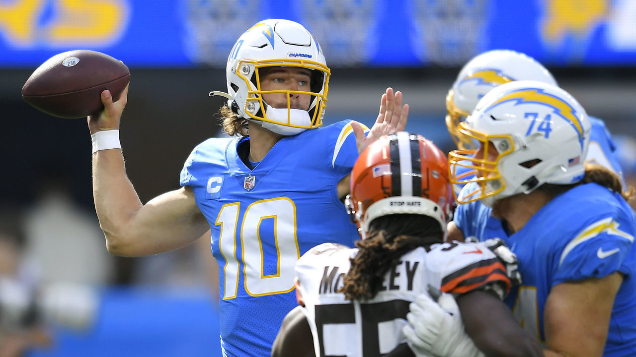 INGLEWOOD, CALIFORNIA - OCTOBER 10: Justin Herbert #10 of the Los Angeles Chargers throws the ball during the third quarter against the Cleveland Browns at SoFi Stadium on October 10, 2021 in Inglewood, California.