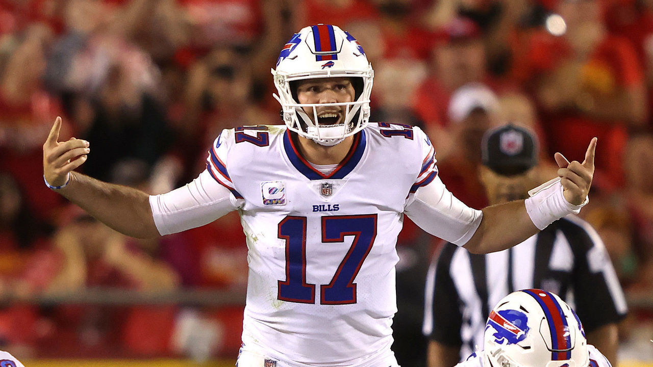 KANSAS CITY, MISSOURI - OCTOBER 10: Josh Allen #17 of the Buffalo Bills motions at the line of scrimmage during the first half of a game against the Kansas City Chiefs at Arrowhead Stadium on October 10, 2021 in Kansas City, Missouri.