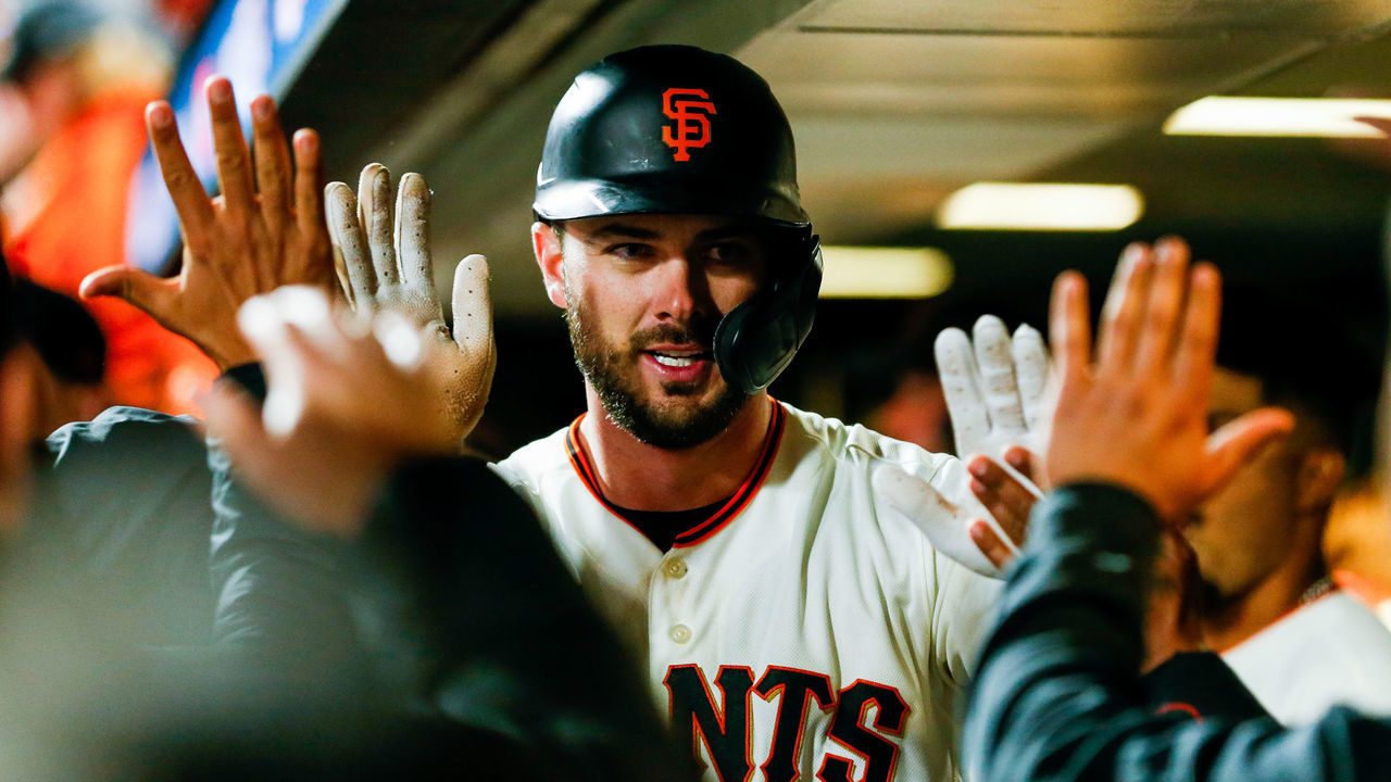 SAN FRANCISCO, CA - OCTOBER 08: Kris Bryant #23 of the San Francisco Giants celebrates with teammates in the dugout after hitting a solo home run in the seventh inning of Game 1 of the NLDS between the Los Angeles Dodgers and the San Francisco Giants at Oracle Park on Friday, October 8, 2021 in San Francisco, California.