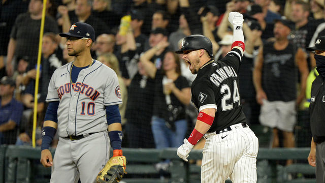 CHICAGO - OCTOBER 10: Yasmani Grandal #24 of the Chicago White Sox reacts after hitting a two-run home run in the third inning during Game Three of the American League Division Series against the Houston Astros on October 10, 2021 at Guaranteed Rate Field in Chicago, Illinois.