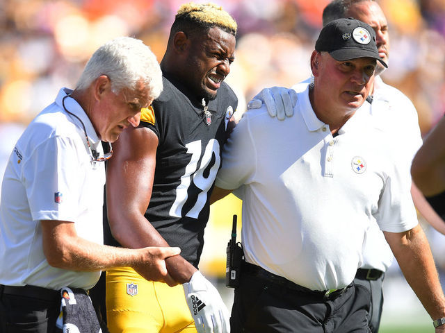 PITTSBURGH, PENNSYLVANIA - OCTOBER 10: JuJu Smith-Schuster #19 of the Pittsburgh Steelers reacts after being injured against the Denver Broncos during the second quarter at Heinz Field on October 10, 2021 in Pittsburgh, Pennsylvania.