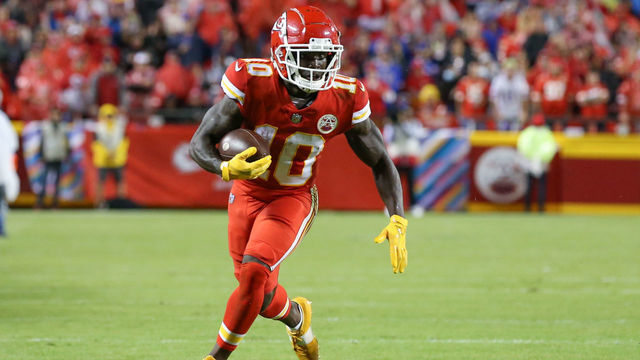 KANSAS CITY, MO - OCTOBER 10: Kansas City Chiefs wide receiver Tyreek Hill (10) runs after the catch late in the third quarter of an NFL football game between the Buffalo Bills and Kansas City Chiefs on Oct 10, 2021 at GEHA Filed at Arrowhead Stadium in Kansas City, MO.