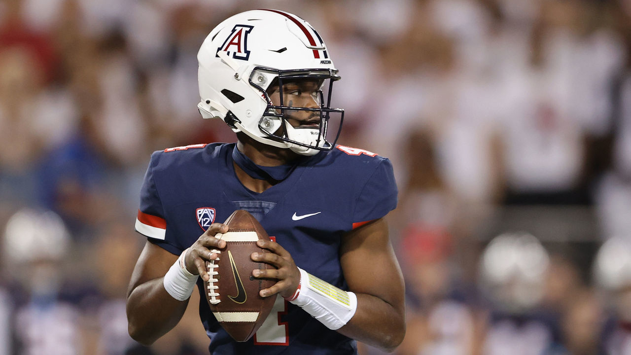 TUCSON, ARIZONA - OCTOBER 09: Quarterback Jordan McCloud #4 of the Arizona Wildcats drops back to pass during the first half of the NCAAF game against the UCLA Bruins at Arizona Stadium on October 09, 2021 in Tucson, Arizona.
