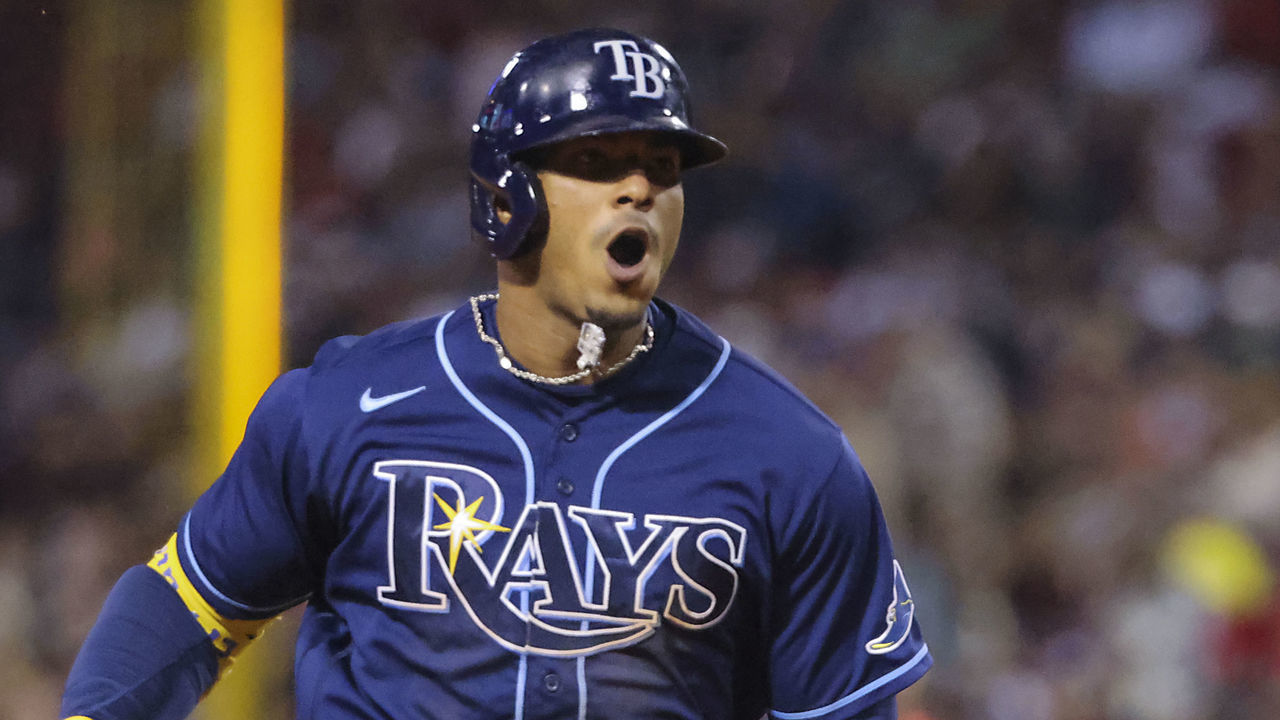 Boston - October 10: Tampa Bay Rays shortstop Wander Franco (5) hits a solo home run against the Boston Red Sox during the eighth inning. The Boston Red Sox host the Tampa Bay Rays in Game 3 of the ALDS at Fenway Park in Boston on Oct. 10, 2021.