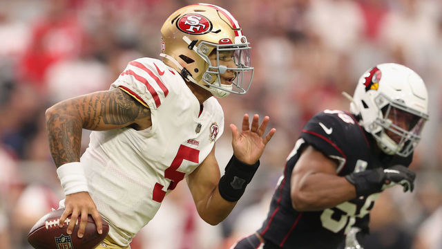 GLENDALE, ARIZONA - OCTOBER 10: Quarterback Trey Lance #5 of the San Francisco 49ers rushes the football during the NFL game at State Farm Stadium on October 10, 2021 in Glendale, Arizona. The Cardinals defeated the 49ers 17-10.
