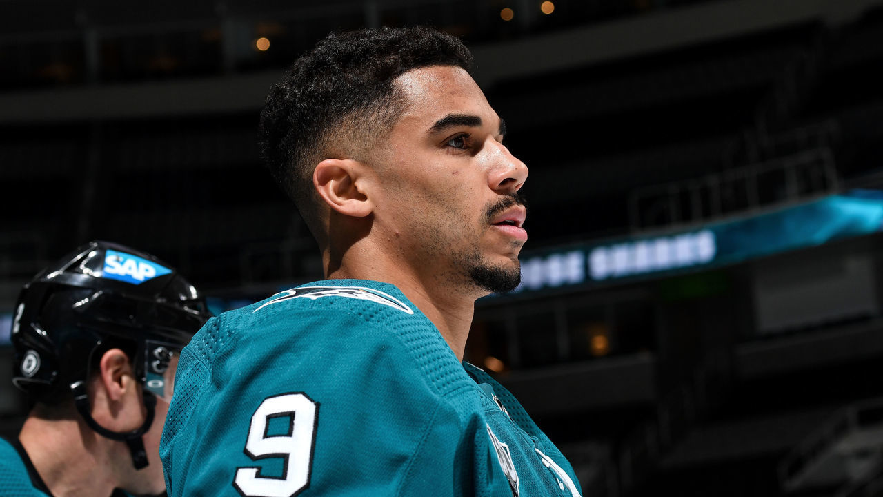 SAN JOSE, CA - MARCH 22: Evander Kane #9 of the San Jose Sharks looks on during warmups against the Los Angeles Kings at SAP Center on March 22, 2021 in San Jose, California.
