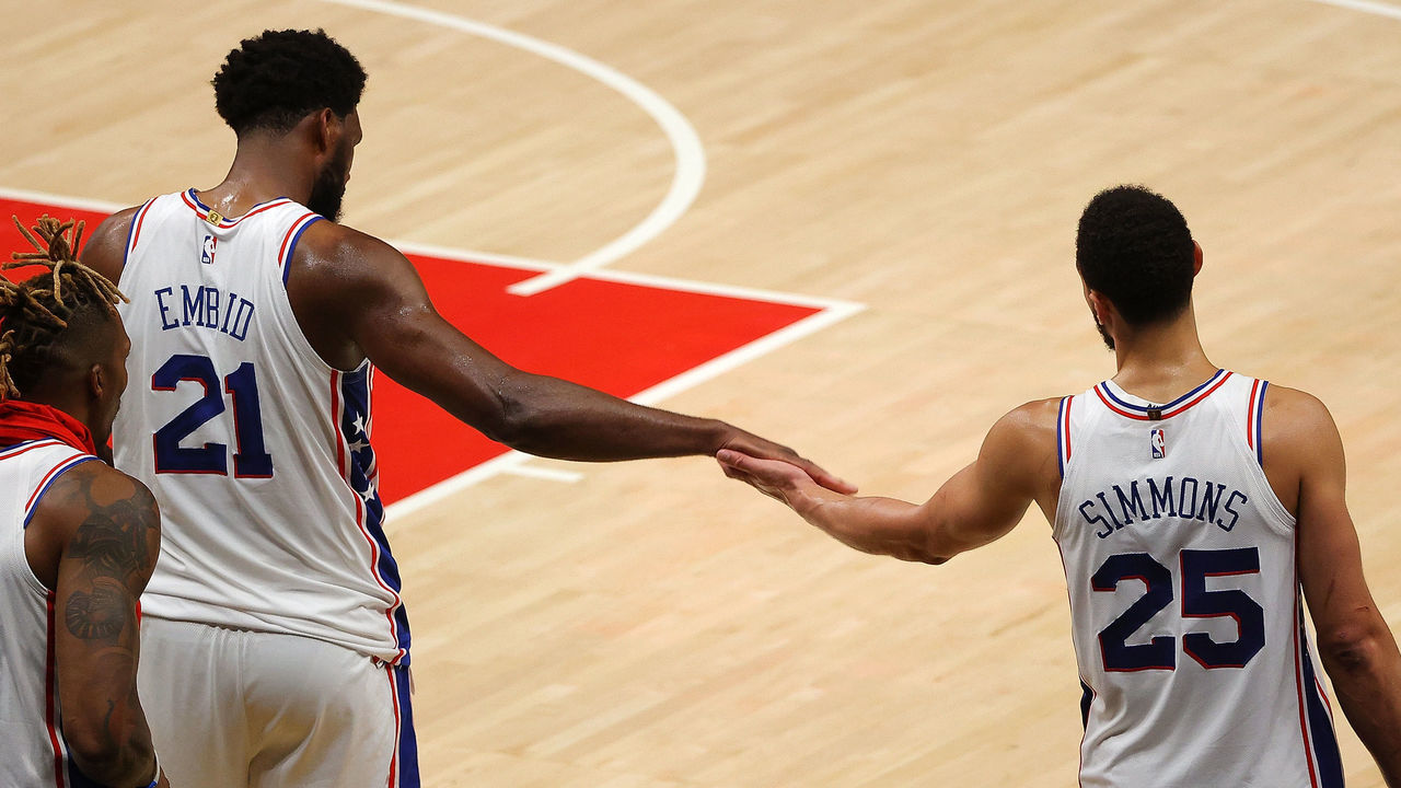 ATLANTA, GEORGIA - JUNE 11: Joel Embiid #21 and Ben Simmons #25 of the Philadelphia 76ers react in the final minutes of their 127-111 win over the Atlanta Hawks in game 3 of the Eastern Conference Semifinals at State Farm Arena on June 11, 2021 in Atlanta, Georgia.