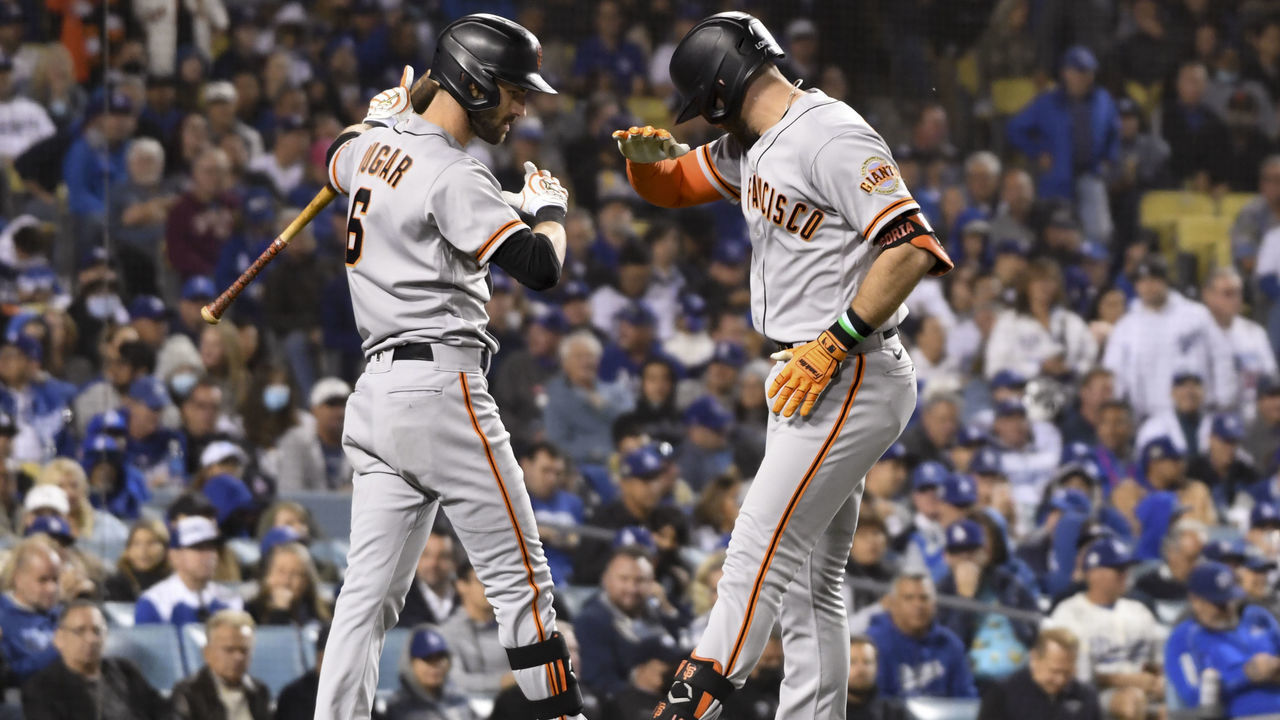Los Angeles, CA - October 11: San Francisco Giants' Evan Longoria, right, celebrates with Steven Duggar after a Longoria solo home run during the fifth inning in game three of the 2021 National League Division Series against the Los Angeles Dodgers at Dodger Stadium on Monday, Oct. 11, 2021 in Los Angeles, CA.(Wally Skalij / Los Angeles Times via Getty Images)