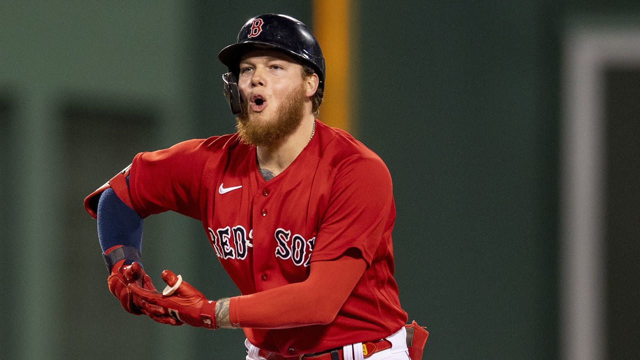 BOSTON, MA - OCTOBER 11: Alex Verdugo #99 of the Boston Red Sox reacts after hitting an RBI double during the third inning of game four of the 2021 American League Division Series against the Tampa Bay Rays at Fenway Park on October 11, 2021 in Boston, Massachusetts.