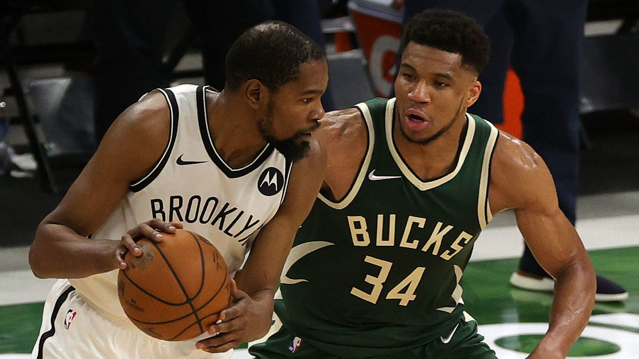 MILWAUKEE, WISCONSIN - MAY 02: Kevin Durant #7 of the Brooklyn Nets is defended by Giannis Antetokounmpo #34 of the Milwaukee Bucks during the second half of a game at Fiserv Forum on May 02, 2021 in Milwaukee, Wisconsin.