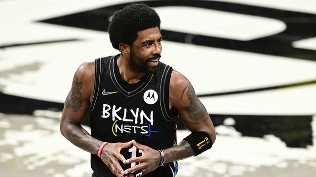 NEW YORK, NEW YORK - JUNE 07: Kyrie Irving #11 of the Brooklyn Nets reacts after being called for a foul against the Milwaukee Bucks in Game Two of the Second Round of the 2021 NBA Playoffs at Barclays Center on June 07, 2021 in New York City.