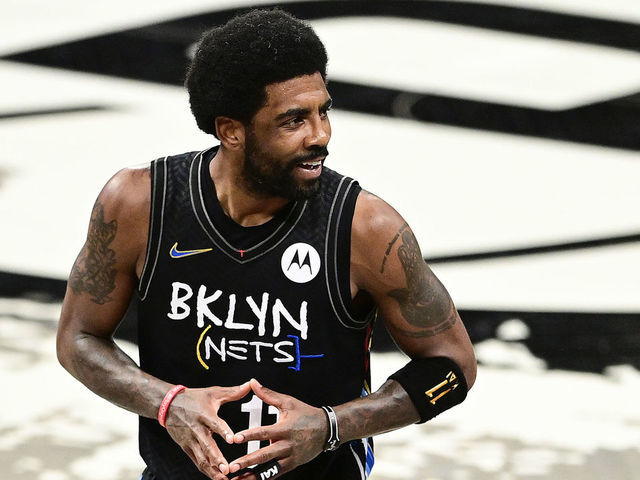 NEW YORK, NEW YORK - JUNE 07: Kyrie Irving #11 of the Brooklyn Nets reacts after being called for a foul against the Milwaukee Bucks in Game Two of the Second Round of the 2021 NBA Playoffs at Barclays Center on June 07, 2021 in New York City.
