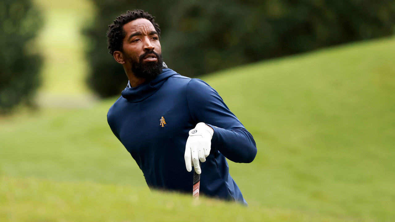 BURLINGTON, NORTH CAROLINA - OCTOBER 11: Former NBA player J.R. Smith of the North Carolina A&T Aggies looks down the fairway as he steps up to the tee box during the Phoenix Invitational at Alamance Country Club on October 11, 2021 in Burlington, North Carolina.