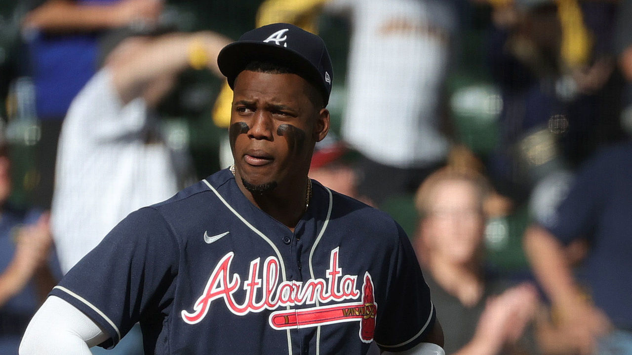 MILWAUKEE, WISCONSIN - OCTOBER 08: Jorge Soler #12, Freddie Freeman #5 and Ozzie Albies #1 of the Atlanta Braves on the field prior to game 1 of the National League Division Series against the Milwaukee Brewers at American Family Field on October 08, 2021 in Milwaukee, Wisconsin.