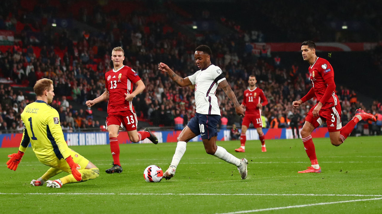 LONDON, ENGLAND - OCTOBER 12: Raheem Sterling of England is denied by Peter Gulacsi of Hungary during the 2022 FIFA World Cup Qualifier match between England and Hungary at Wembley Stadium on October 12, 2021 in London, England.