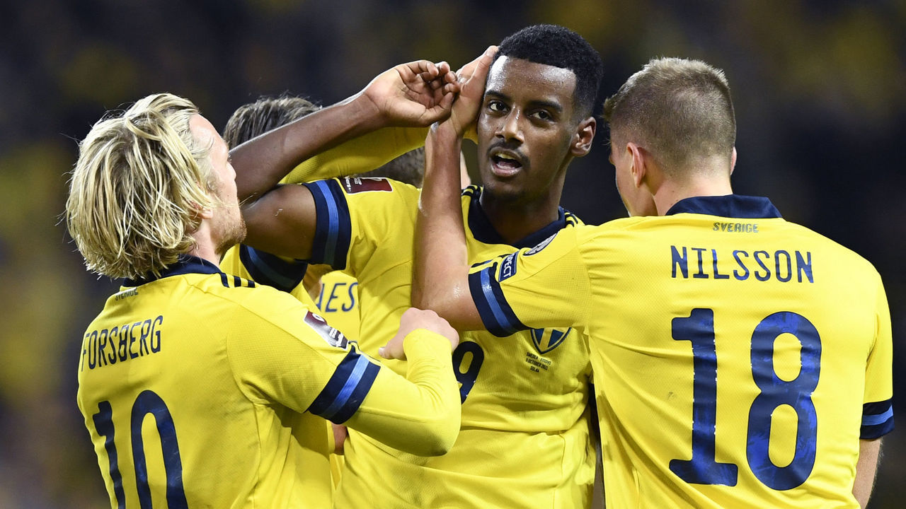 Sweden's forward Alexander Isak (C) celebrates scoring his team's first goal with his team mates during the FIFA World Cup Qatar 2022 qualification Group B football match between Sweden and Kosovo at the Friends Arena in Solna, Sweden, on October 9, 2021. - - Sweden OUT