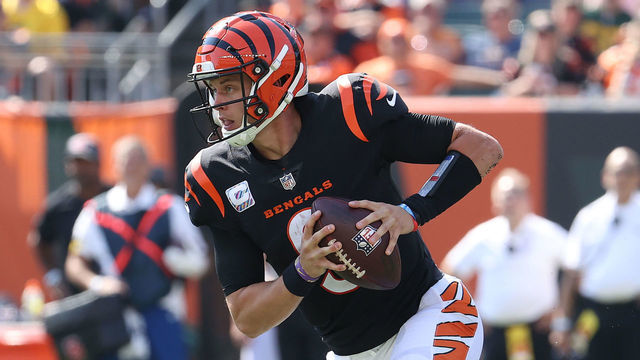 CINCINNATI, OHIO - OCTOBER 10: Joe Burrow #9 of the Cincinnati Bengals runs with the ball against the Green Bay Packers at Paul Brown Stadium on October 10, 2021 in Cincinnati, Ohio.