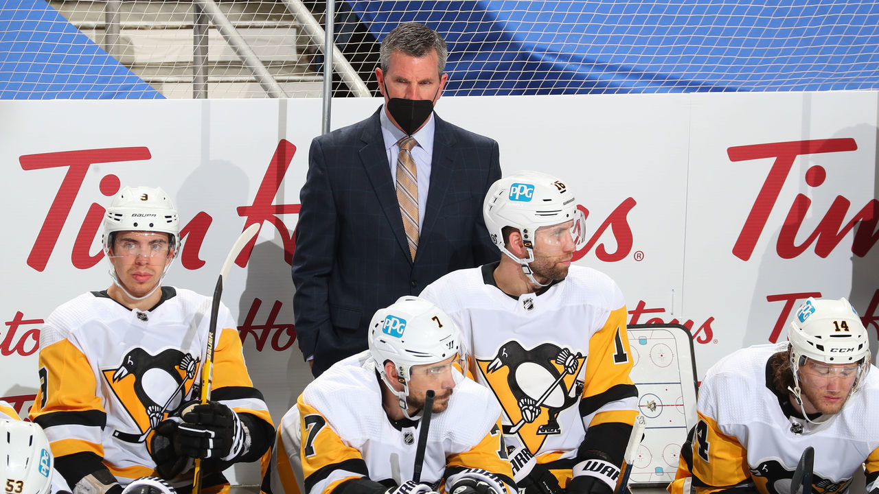 BUFFALO, NY - APRIL 18: Head coach Mike Sullivan of the Pittsburgh Penguins watches the action during an NHL game against the Buffalo Sabres on April 18, 2021 at KeyBank Center in Buffalo, New York. Buffalo won, 4-2.