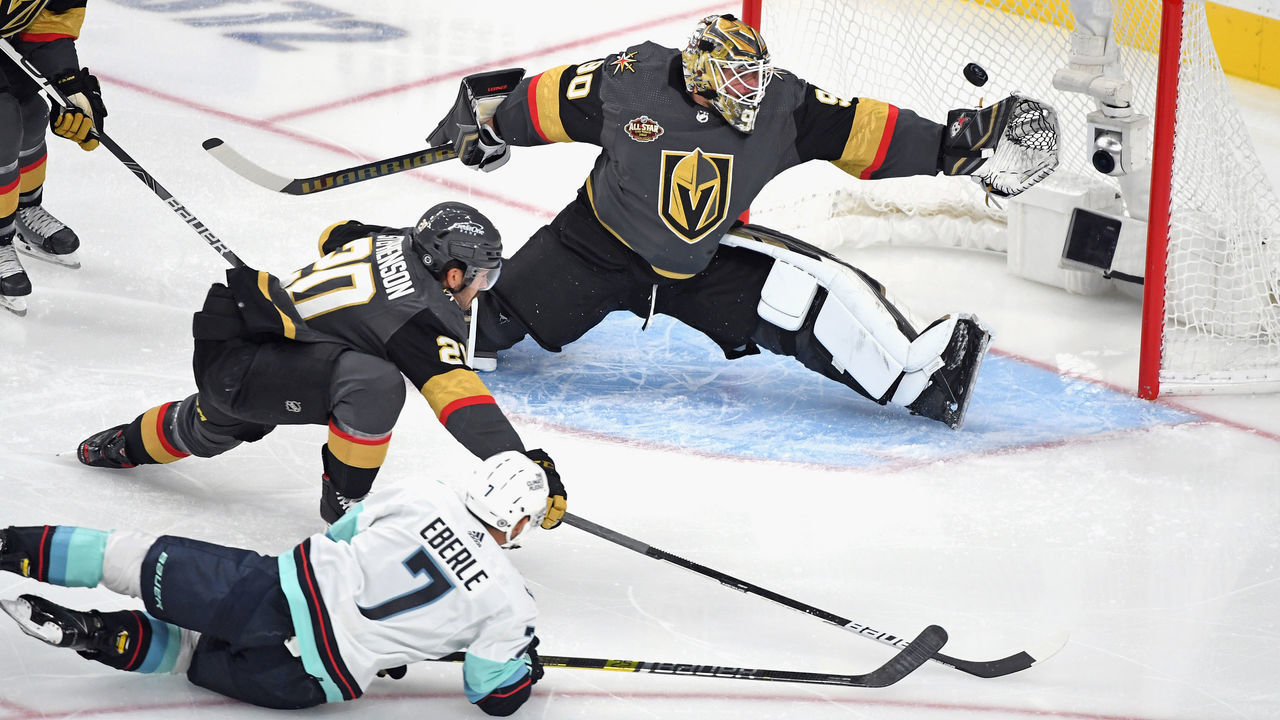 LAS VEGAS, NEVADA - OCTOBER 12: Jordan Eberle #7 of the Seattle Kraken hits the crossbar behind Robin Lehner #90 of the Vegas Golden Knights during the first period of the Kraken's inaugural regular-season game at T-Mobile Arena on October 12, 2021 in Las Vegas, Nevada.