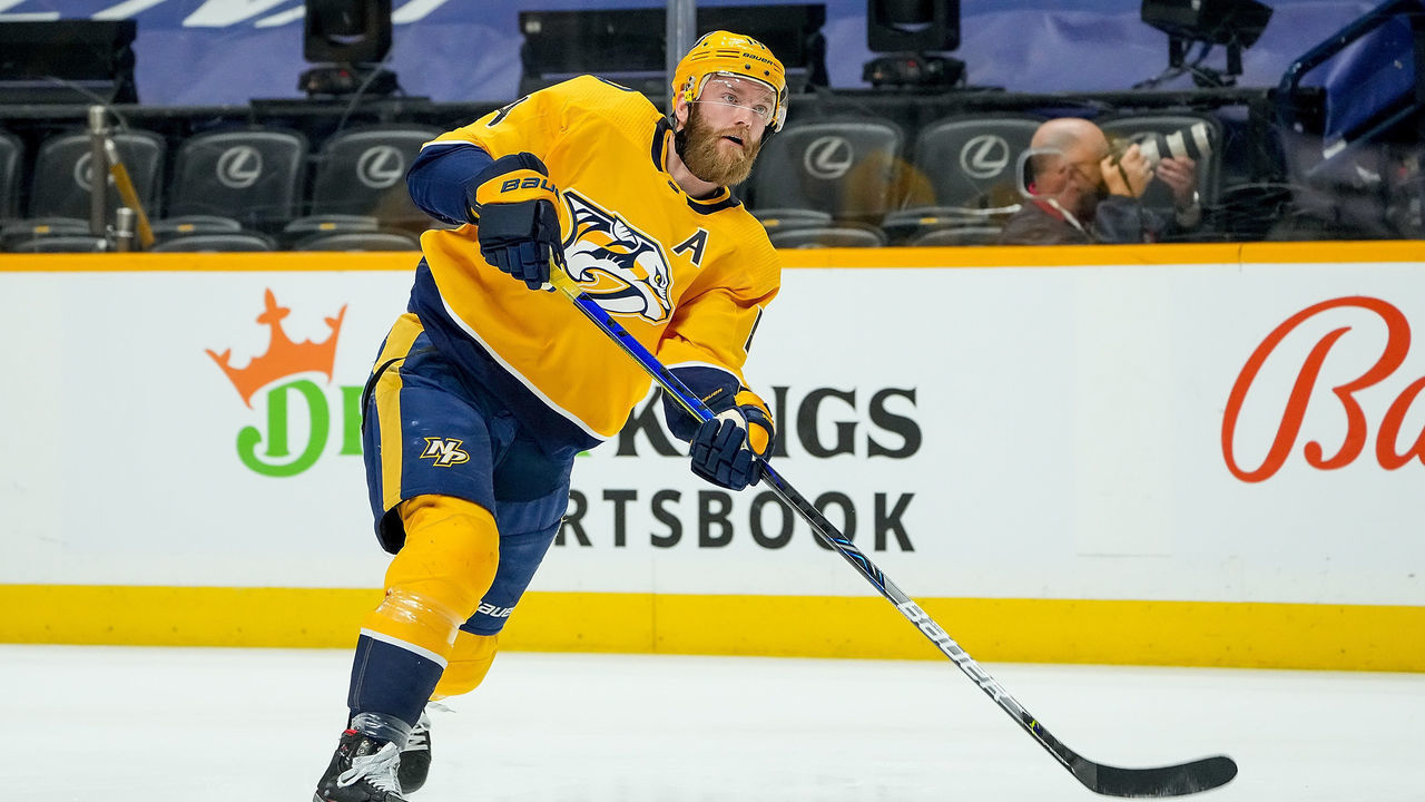 NASHVILLE, TN - MAY 27: Mattias Ekholm #14 of the Nashville Predators skates against the Carolina Hurricanes in Game Six of the First Round of the 2021 Stanley Cup Playoffs at Bridgestone Arena on May 27, 2021 in Nashville, Tennessee.