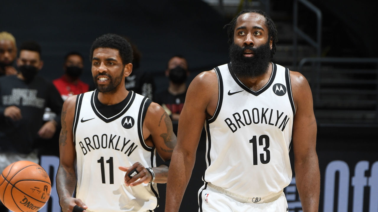 LOS ANGELES, CA - FEBRUARY 21: Kyrie Irving #11 and James Harden #13 of the Brooklyn Nets look on during the game against the LA Clippers on February 21, 2021 at STAPLES Center in Los Angeles, California. NOTE TO USER: User expressly acknowledges and agrees that, by downloading and/or using this Photograph, user is consenting to the terms and conditions of the Getty Images License Agreement. Mandatory Copyright Notice: Copyright 2021 NBAE