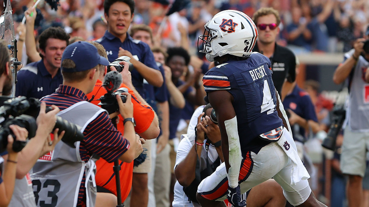 AUBURN, ALABAMA - OCTOBER 09: Tank Bigsby #4 of the Auburn Tigers reacts after rushing for a touchdown against the Georgia Bulldogs during the second half at Jordan-Hare Stadium on October 09, 2021 in Auburn, Alabama.