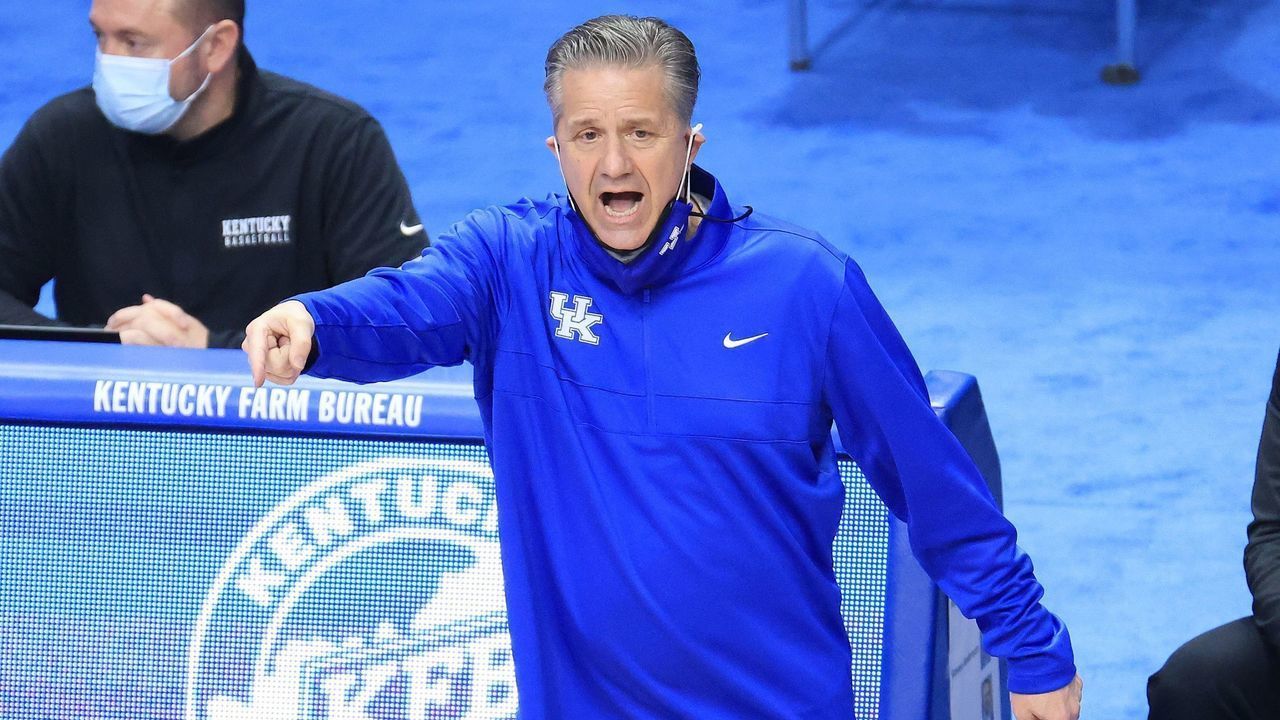 LEXINGTON, KENTUCKY - FEBRUARY 09: John Calipari the head coach of the Kentucky Wildcats shoots gives instructions to his team against the Arkansas Razorbacks at Rupp Arena on February 09, 2021 in Lexington, Kentucky.