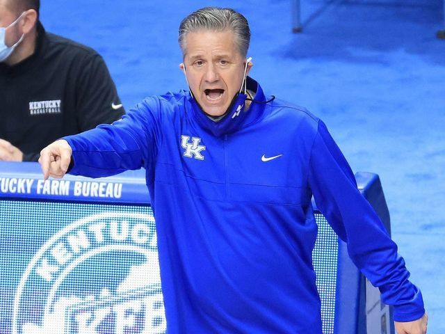 LEXINGTON, KENTUCKY - FEBRUARY 09: John Calipari the head coach of the Kentucky Wildcats shoots gives instructions to his team against the Arkansas Razorbacks at Rupp Arena on February 09, 2021 in Lexington, Kentucky.
