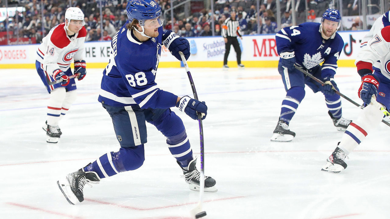 Toronto, ON- October 13 - Toronto Maple Leafs center William Nylander (88) unleashes what will be the winning goal as the Toronto Maple Leafs beat the Montreal Canadiens 2-1 to open the 2021-22 NHL season in Toronto. October 13, 2021. (Steve Russell/Toronto Star via Getty Images)