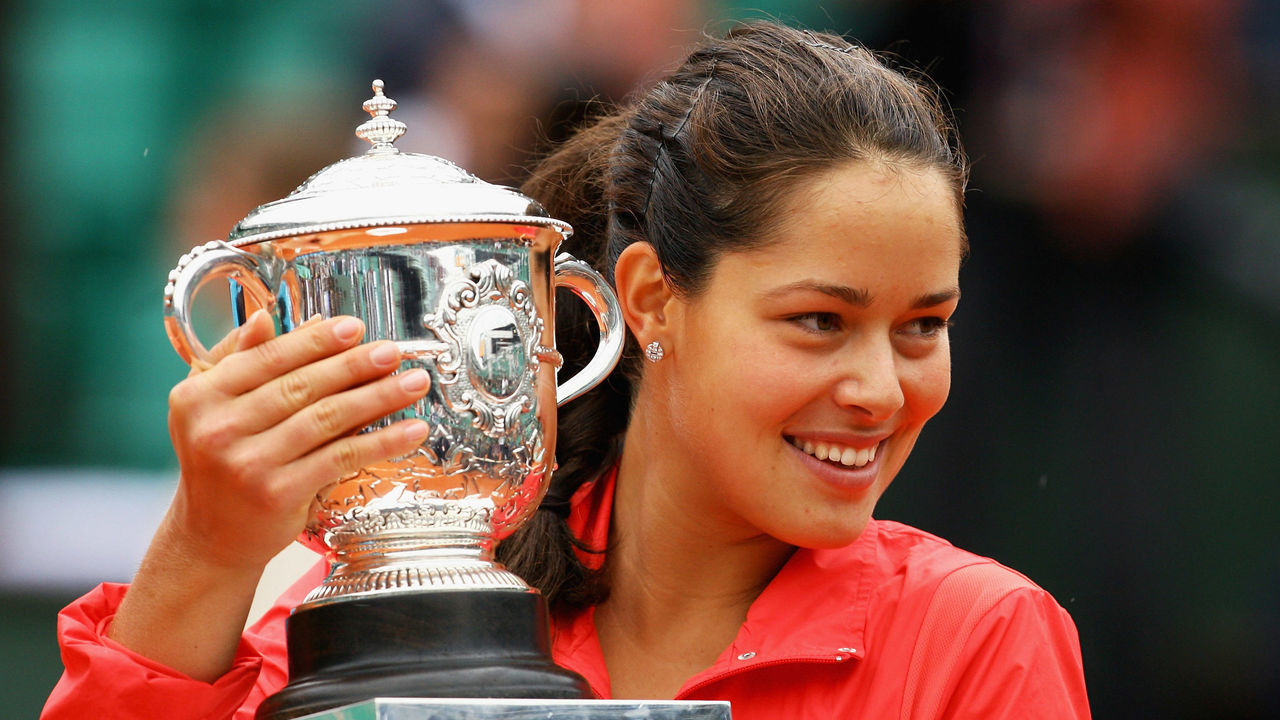 PARIS - JUNE 07: Ana Ivanovic of Serbia celebrates with the trophy following her victory during the Women's Singles Final match against Dinara Safina of Russia on day fourteen of the French Open at Roland Garros on June 7, 2008 in Paris, France.