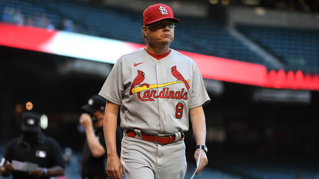 PHOENIX, ARIZONA - MAY 27: Manager Mike Shildt #8 of the St Louis Cardinals walks back to the dugout after the pregame meeting at home plate prior to a game against the Arizona Diamondbacks at Chase Field on May 27, 2021 in Phoenix, Arizona.