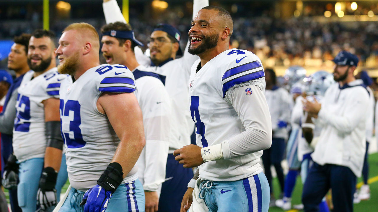 ARLINGTON, TEXAS - OCTOBER 10: Dak Prescott #4 of the Dallas Cowboys celebrates after defeating the New York Giants at AT&T Stadium on October 10, 2021 in Arlington, Texas.