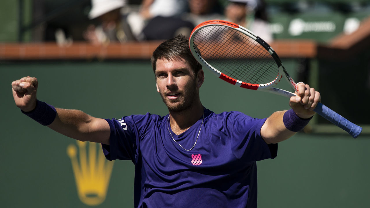 INDIAN WELLS, CALIFORNIA - OCTOBER 14: Cameron Norrie of Great Britain celebrates his victory over Diego Schwartzman of Argentina in the quarter finals of the BNP Paribas Open at the Indian Wells Tennis Garden on October 14, 2021 in Indian Wells, California.