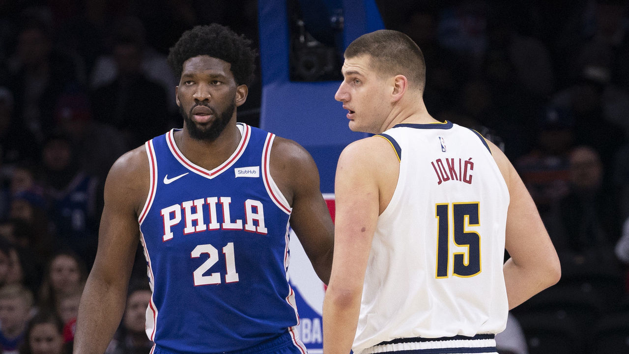 PHILADELPHIA, PA - DECEMBER 10: Joel Embiid #21 of the Philadelphia 76ers and Nikola Jokic #15 of the Denver Nuggets in action at the Wells Fargo Center on December 10, 2019 in Philadelphia, Pennsylvania. NOTE TO USER: User expressly acknowledges and agrees that, by downloading and/or using this photograph, user is consenting to the terms and conditions of the Getty Images License Agreement.