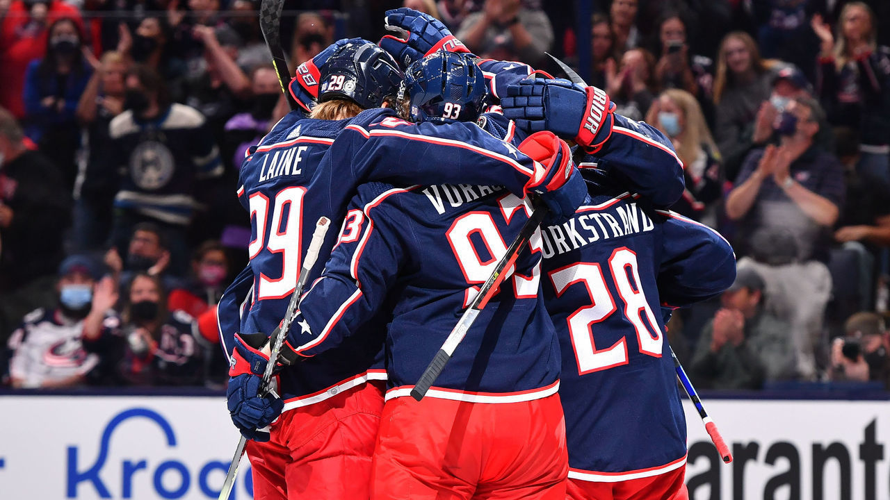 COLUMBUS, OH - OCTOBER 14: Oliver Bjorkstrand #28 of the Columbus Blue Jackets celebrates with teammates after scoring in the first period during a game against the Arizona Coyotes at Nationwide Arena on October 14, 2021 in Columbus, Ohio.