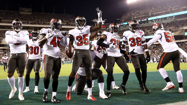 PHILADELPHIA, PENNSYLVANIA - OCTOBER 14: Cornerback Jamel Dean #35 of the Tampa Bay Buccaneers celebrates after intercepting a Philadelphia Eagles pass in the second quarter at Lincoln Financial Field on October 14, 2021 in Philadelphia, Pennsylvania.