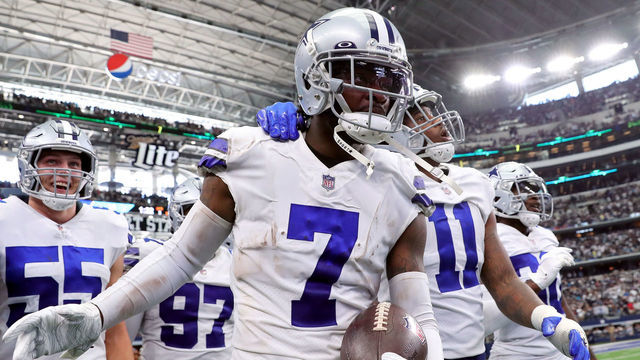 ARLINGTON, TEXAS - OCTOBER 03: Trevon Diggs #7 of the Dallas Cowboys celebrates after an interception during the third quarter against the Carolina Panthers at AT&T Stadium on October 03, 2021 in Arlington, Texas.
